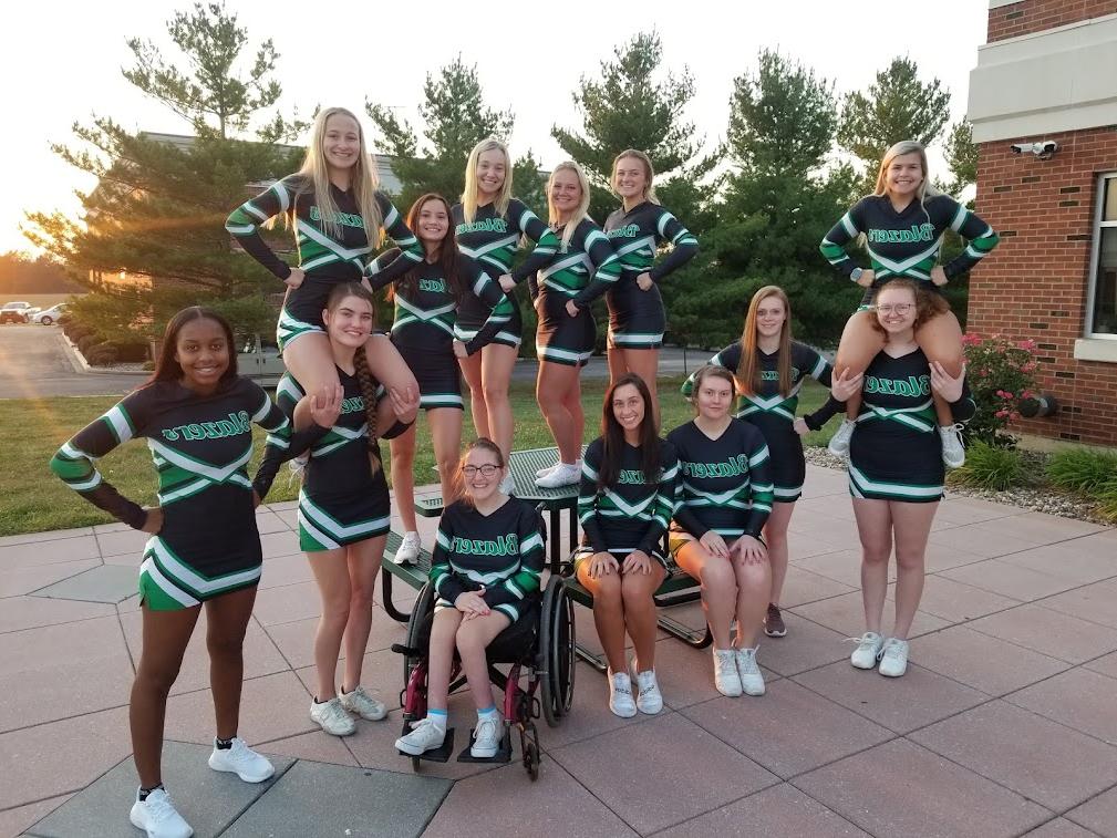 JWCC Student Grace Meyer with the JWCC Cheerleaders